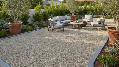 Pea gravel patio installation with outdoor furniture by Chop Chop Landscaping in Los Angeles, CA